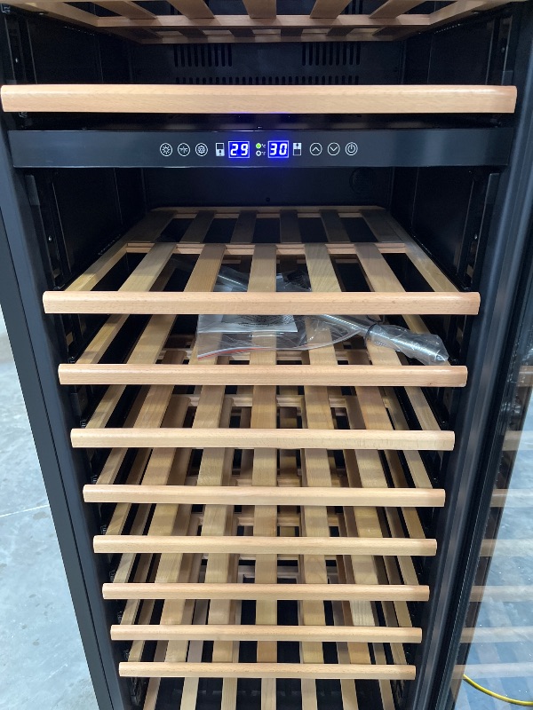 Photo 1 of MZAVP 200 Bottle Wine Fridge Dual Zone, Wine Refrigerator 24 Inch Freestanding/Built-in, Large Wine Cooler Refrigerator with Advanced Temperature Control & Compressor Cooling, Quiet Operation - Silver-----THERE IS A MINOR DENT ON THE BACKSIDE FROM SHIPPIN