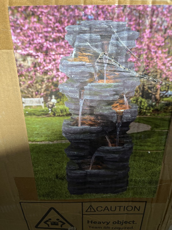 Photo 1 of Jocoevol 40" Outdoor Water Fountain with LED Lights - 7-Tier Cascading Rock Waterfall Fountain, Natural Rock Look, Ideal for Garden, Landscaping, Patio, Balconies and Yard Decor