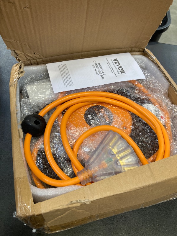 Photo 1 of VEVOR Retractable Extension Cord Reel, 45 FT, Heavy Duty 12AWG/3C SJTOW Power Cord, with Lighted Triple Tap Outlet, 15 Amp Circuit Breaker, 180° Swivel Bracket for Ceiling or Wall Mount