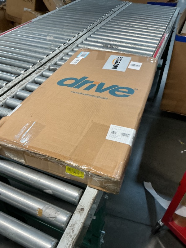 Photo 1 of ***missing one wheel for parts only***

Drive Medical Overbed Table with Wheels - Secure Height Adjustment for Comfort - Non Tilt Surface - Smooth Rolling Design - Home & Hospital Use - Woodgrain Laminate Top - Silver Vein