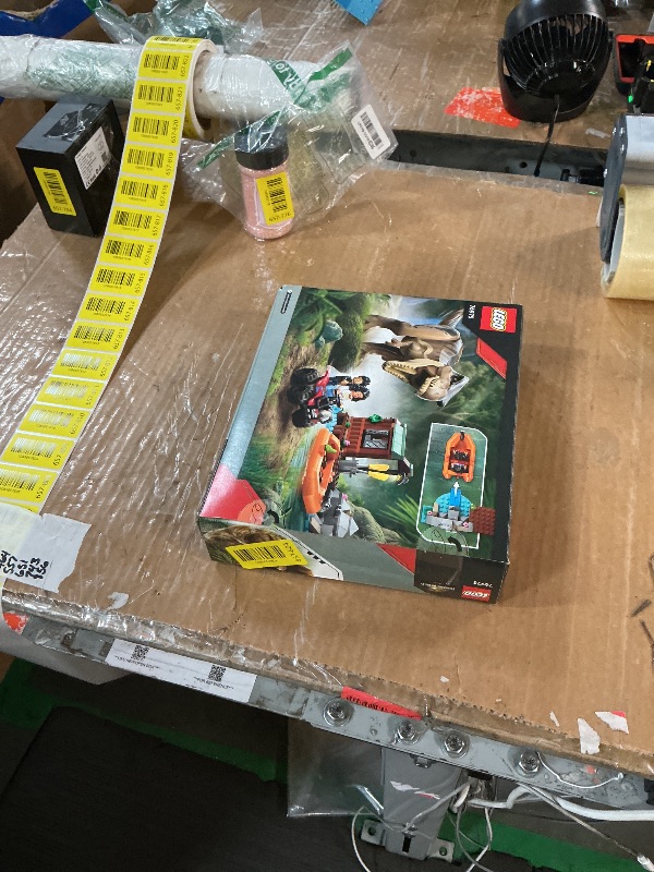 View 2 of ***MISSING DINO AND PARTS OF SET***
LEGO Jurassic World T. rex River Escape - Dinosaur Toy for Kids, Boys, and Girls, Ages 5-7 - Jurassic World Toy Boat Minifigures - Creative Dinosaur Gift for Movie Fans - 76975