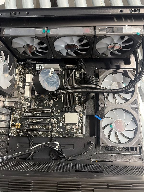 View 5 of **MISSING RAM CPU GPU SSD**DAMAGE TO MOTHERBOARD**
**FOR PARTS ONLY**DOES NOT WORK**
ZOTAC MEK Gaming PC Desktop Ultra 9 285K, NVIDIA RTX 5090 32GB, Infinity
AMP Extreme Infinity, 32GB DDR5, 2TB NVMe SSD, 1200W 80+ Gold PSU, WiFi 6E, Bluetooth 5.3, Wi