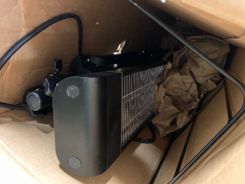 Photo 1 of ***STOCK PHOTO FOR REFERENCE ONLY*** Pro 1500W Carbon Infrared Patio Heater with Tripod Stand | 1500W indoor and outdoor carbon infrared heater with an adjustable tripod stand and convenient remote control.