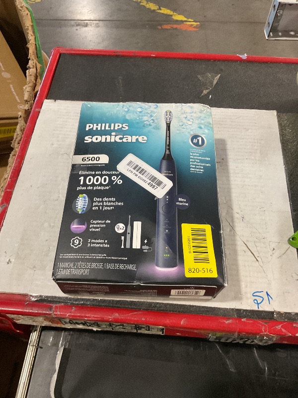 View 9 of ***MISSING PARTS***MAJOR DAMAGE***
Philips Sonicare 6500 Sonic Electric Toothbrush