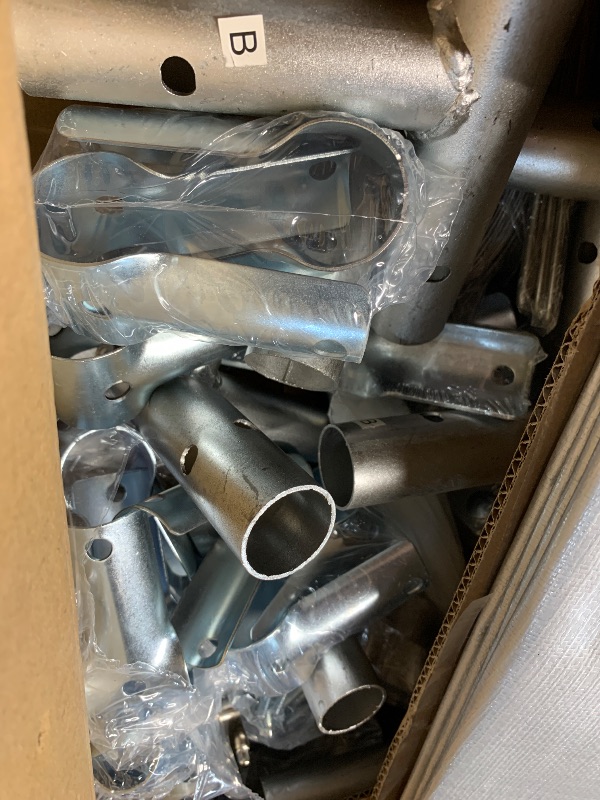Photo 1 of ****Random  connectors and a 3x3 tarp. hardware for an unknown something
