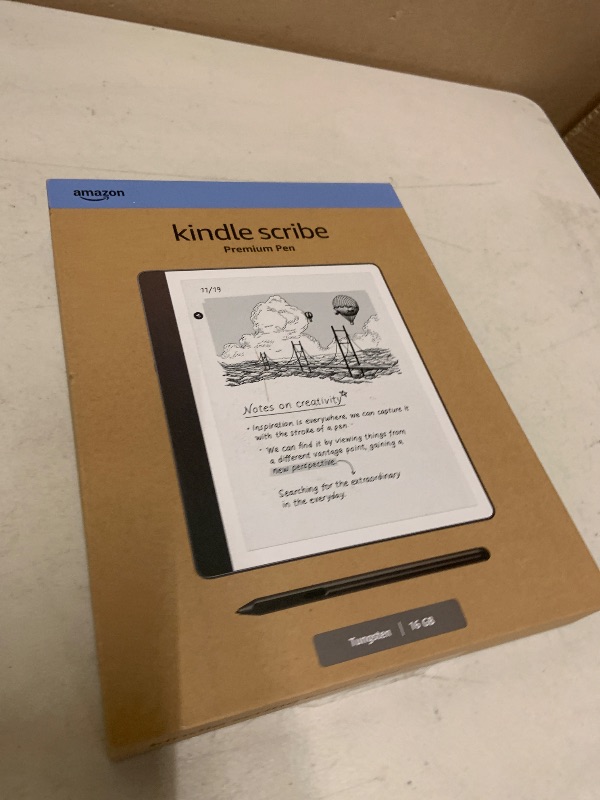 Photo 1 of Amazon Kindle Scribe (16GB) - Your notes, documents and books, all in one place. With built-in AI notebook summarization. Includes Premium Pen - Tungsten