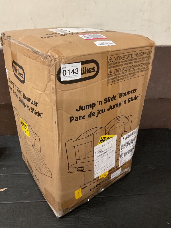 Photo 1 of Little Tikes Jump 'n Slide Inflatable Bouncer Includes Heavy Duty Blower With GFCI, Stakes, Repair Patches, And Storage Bag, for Kids Ages 3-8 Years