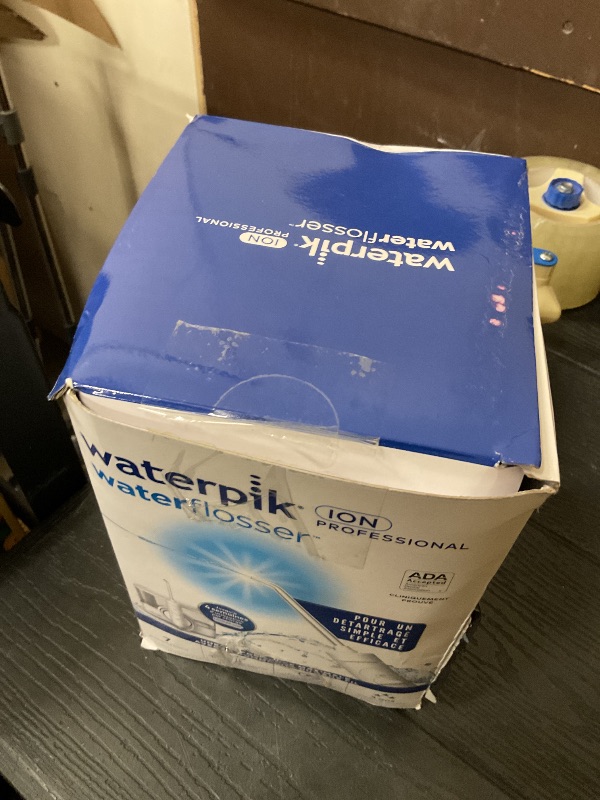 Photo 1 of Waterpik ION Professional Water Flosser, Rechargeable and Portable for Teeth, Gums, Braces, 10 Settings, 7 Flossing Tips For Multiple Users And Needs, ADA Accepted, WF-12 White, Packaging May Vary