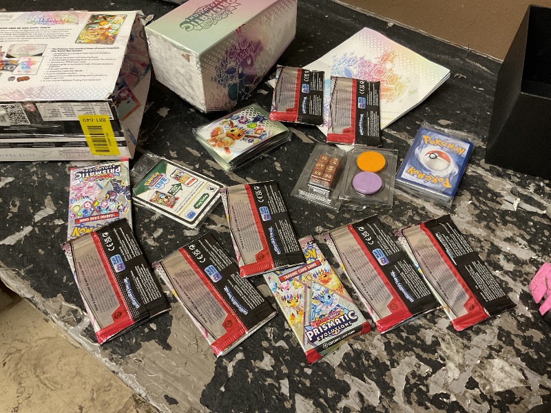 View 4 of Pokemon TCG: Scarlet & Violet Prismatic Evolutions Elite Trainer Box