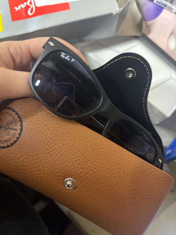 View 4 of Ray-Ban Unisex RB2132 New Wayfarer Polarized Square Sunglasses, Matte Black/Polarized Blue Gradient Grey, 55 mm