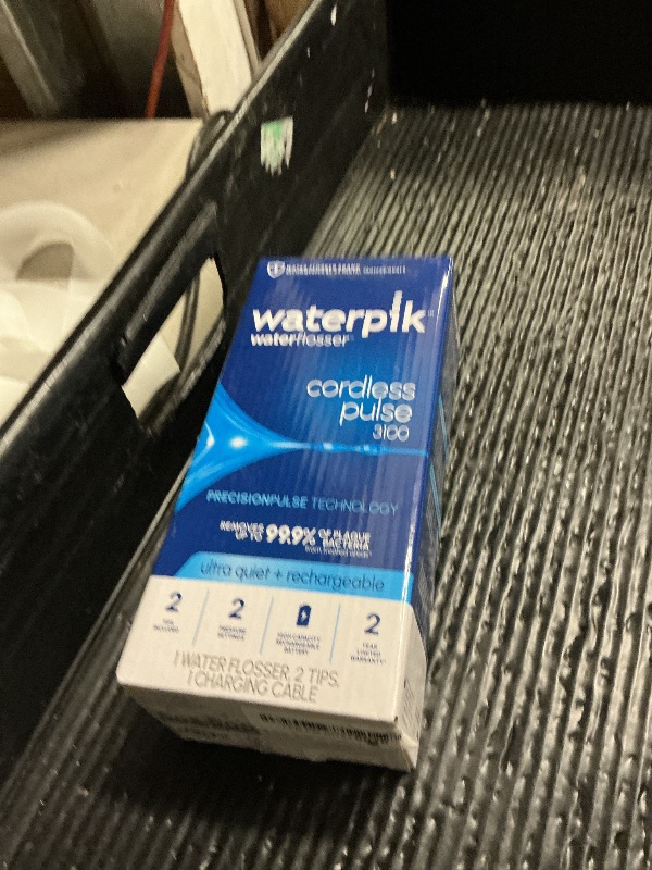 Photo 1 of Waterpik Cordless Pulse 3100 Rechargeable Portable Water Flosser for Teeth, Gums, Braces Care and Travel with 2 Flossing Tips, Waterproof for Shower Use, ADA Accepted, WF-20 Blue, Amazon Exclusive