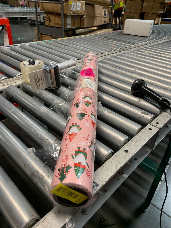 View 2 of ***STOCK PHOTO FOR REFERENCE ONLY***
Ribbli Pink Christmas Wrapping Paper Mini Roll Reversible Christmas Gnome 