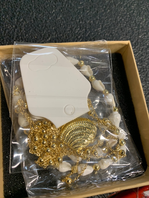 View 2 of ****stock image for reference ****ENSKEFEN Shell Bracelets for Women Boho White Puka Shell Beads Bracelet with Gold Scallop Charm Summer Beach Hawaiian Seashell Slider Bracelet