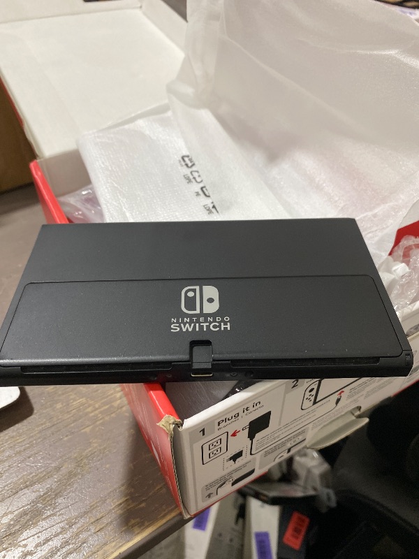 Photo 1 of Nintendo Switch OLED Model w/ White Joy-Con