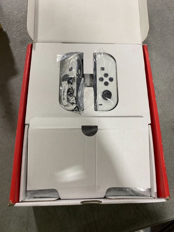 Photo 1 of Nintendo Switch OLED Model w/ White Joy-Con