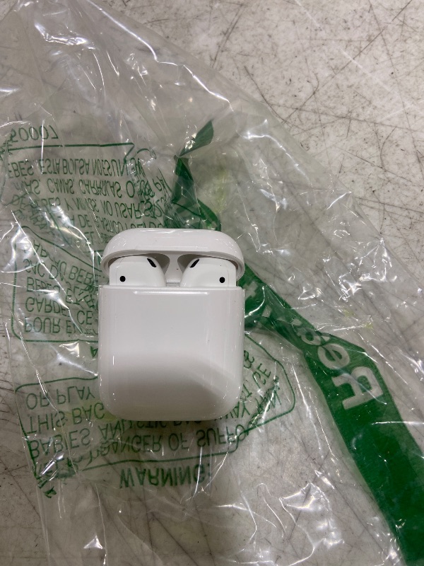 Photo 1 of Apple AirPods Wireless Earbuds with Lightning Charging Case
