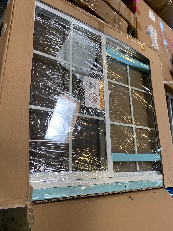 Photo 1 of vinyl wind window