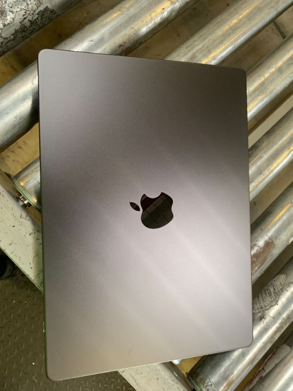 Photo 1 of Apple 2024 MacBook Pro Laptop with M4 chip with 10?core CPU and 10?core GPU: Built for Apple Intelligence, 14.2-inch Liquid Retina XDR Display, 16GB Unified Memory, 512GB SSD Storage; Space Black