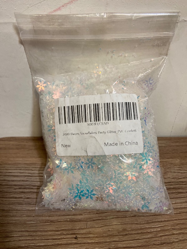 Photo 1 of 2000 Pieces/50g Snowflakes Party Glitter PVC Confetti for Christmas Table Confetti Glitter for Winter Snowfield Wonderland Xmas Party Supplies DIY Craft Projects Party Decorations