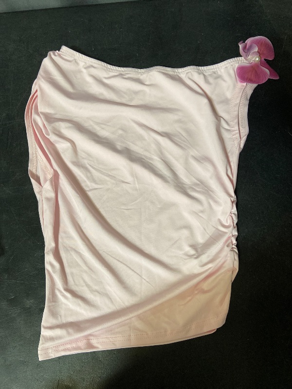 Photo 1 of Size S Pink casual tube top features a stylish one-shoulder design with a delicate flower applique detail