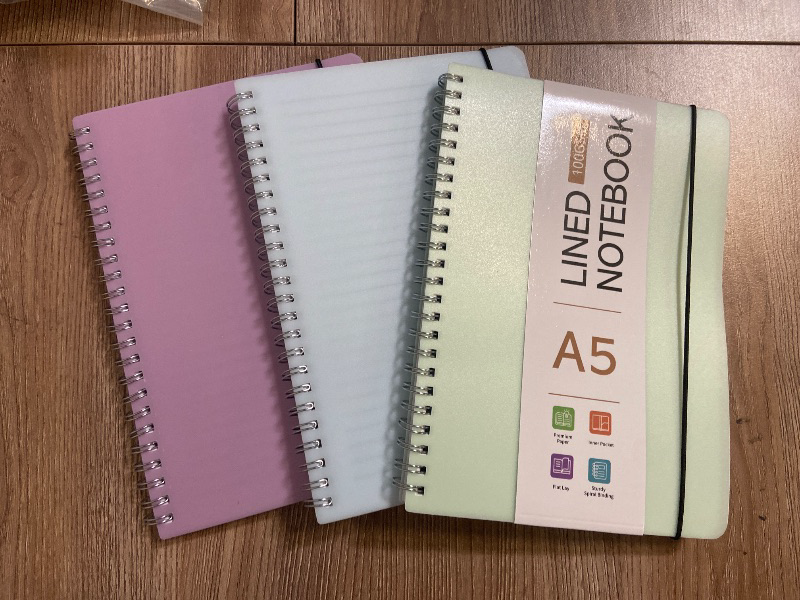 Photo 1 of 3 Pcs Spiral Notebook 5.9x8.3, 140 Pages Small Notebook for Women A5 College Ruled Journals Cute Notebooks with Large Pockets for Home School Office Use - Purple, Green, Blue