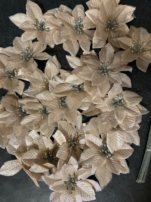View 2 of  Giga Gud 26pcs Artificial Flowers set champagne-colored glitter poinsettia ornaments designed for holiday decorations, such as Christmas tree ornaments, wreaths, and garlands.