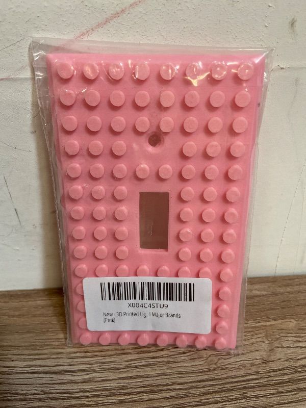 Photo 1 of 3D Printed Light Switch Cover | Durable & Playful Plastic Plate w/ Building Block Design | Includes Color-Coded Screws for Easy DIY Installation | Stylish & Compatible w/ All Brands | Pink
