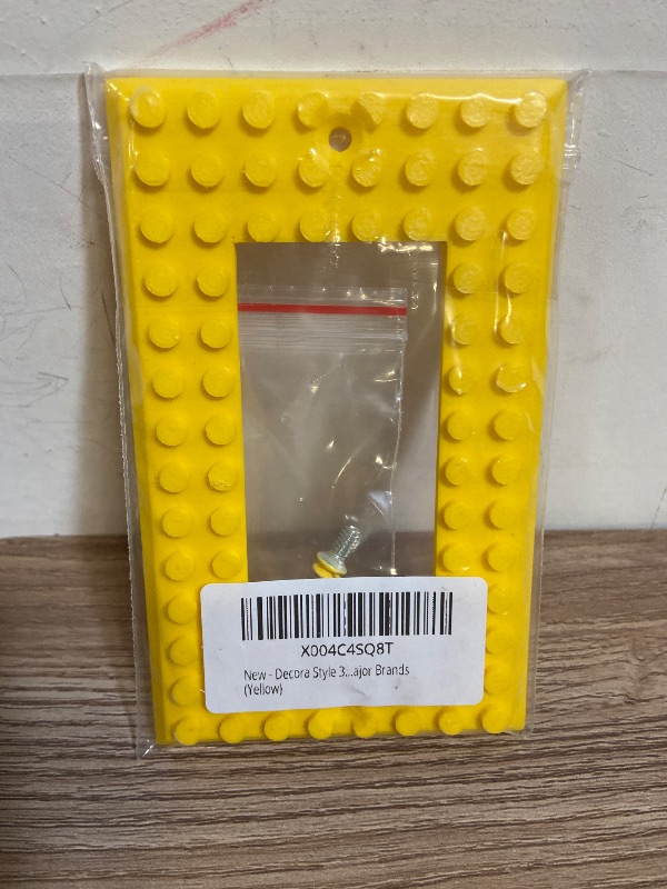 Photo 1 of De Cora 3D Printed Light Switch Cover | Durable & Playful Plastic Plate w/ Building Block Design | Includes Color-Coded Screws for Easy DIY Installation | Stylish & Compatible w/ All Brands | Yellow