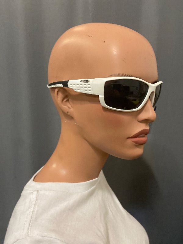 Photo 1 of white sport sunglasses feature ventilated side shields for increased peripheral vision
