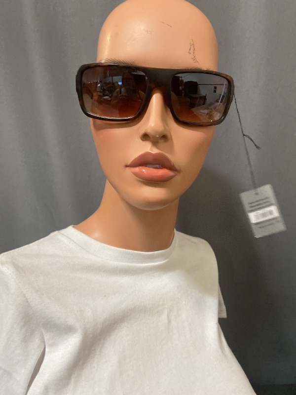 Photo 1 of  sunglasses feature a stylish tortoise frame with bifocal magnification lenses