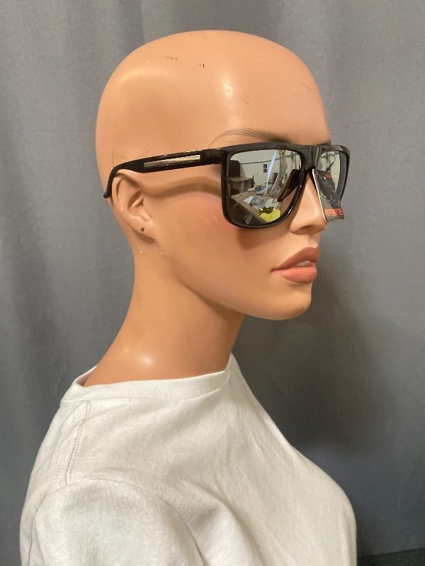 Photo 1 of sunglasses feature a black square frame with mirrored lenses and branded metal detailing on the temple
