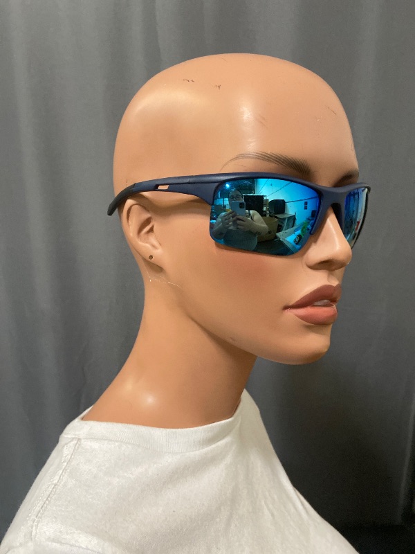 Photo 1 of Blue Mirror sunglasses feature a semi-rimless frame and polarized lenses.