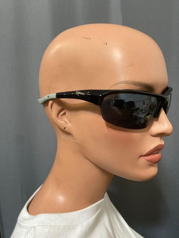 Photo 1 of X-Loop sunglasses feature a black half-frame design with a distinctive white logo on the temple.