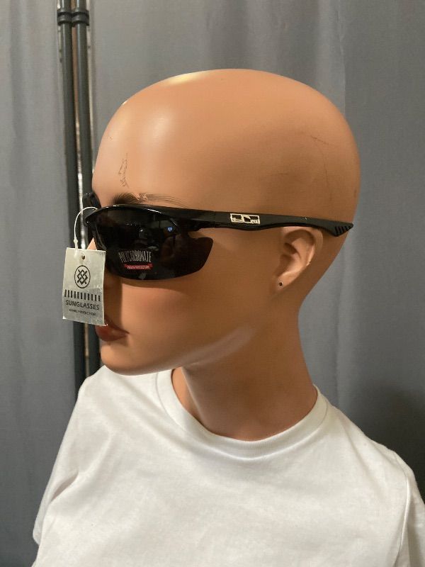 Photo 1 of PROSPORT bifocal reading sunglasses featuring a glossy black sport wrap frame.