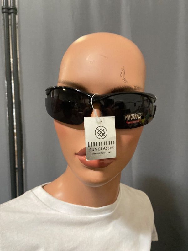 Photo 1 of PROSPORT bifocal reading sunglasses featuring a glossy black sport wrap frame.