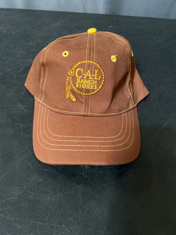 Photo 1 of Brown C-A-L Ranch Stores strap back baseball cap with yellow embroidered logo detailing