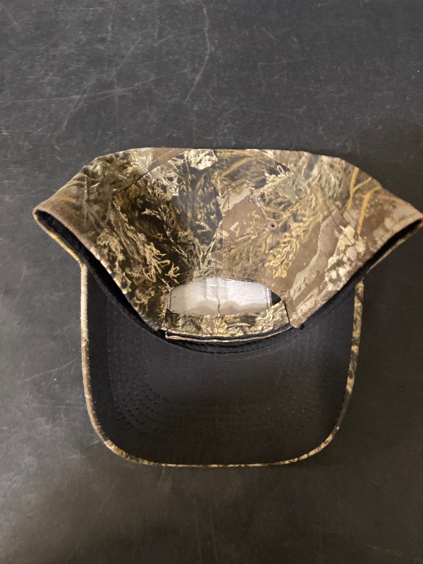 Photo 1 of  Realtree structured baseball hat features a distinctive camouflage pattern and a centered embroidered logo patch