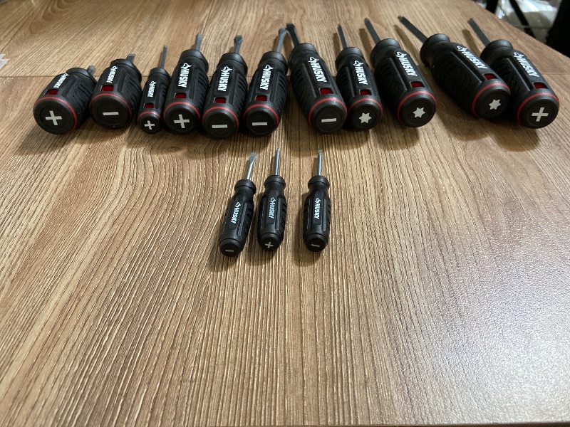 Photo 1 of 14-piece Husky screwdriver set featuring dual-material handles and magnetic tips.