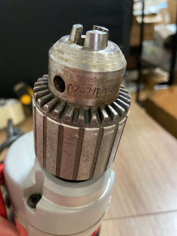 Photo 1 of Milwaukee Magnum Hole-Shooter 1/2-inch corded drill (Model 0234-1)120 Volts, 60 Hz, 5.5 Amps, single-phase AC/DC.