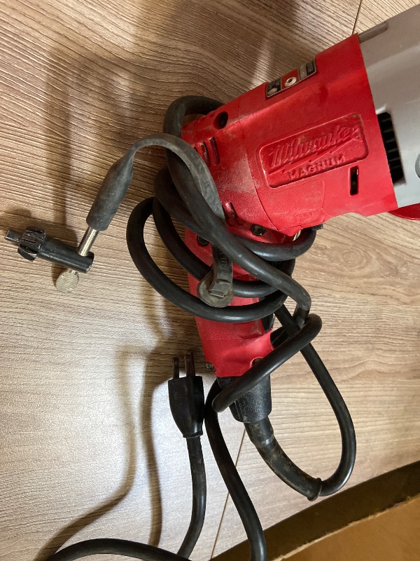 Photo 1 of Milwaukee Magnum Hole-Shooter 1/2-inch corded drill (Model 0234-1)120 Volts, 60 Hz, 5.5 Amps, single-phase AC/DC.
