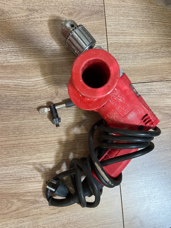 Photo 1 of Milwaukee Magnum Hole-Shooter 1/2-inch corded drill (Model 0234-1)120 Volts, 60 Hz, 5.5 Amps, single-phase AC/DC.
