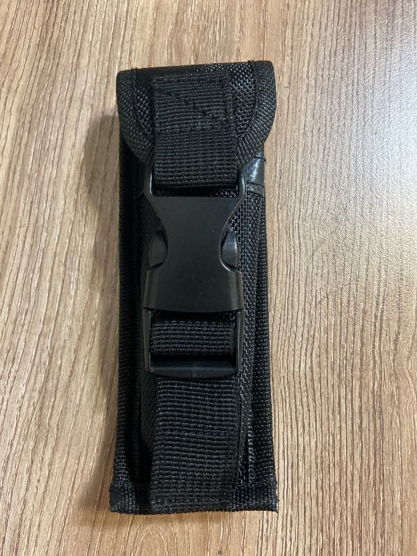 Photo 1 of *6inx2in Black nylon sheath typically designed for a folding knife or multi-tool