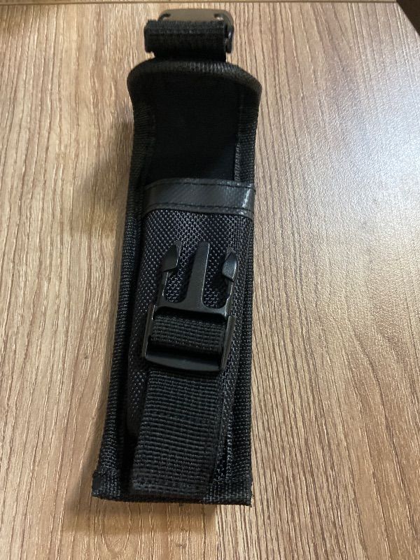 Photo 1 of *6inx2in Black nylon sheath typically designed for a folding knife or multi-tool