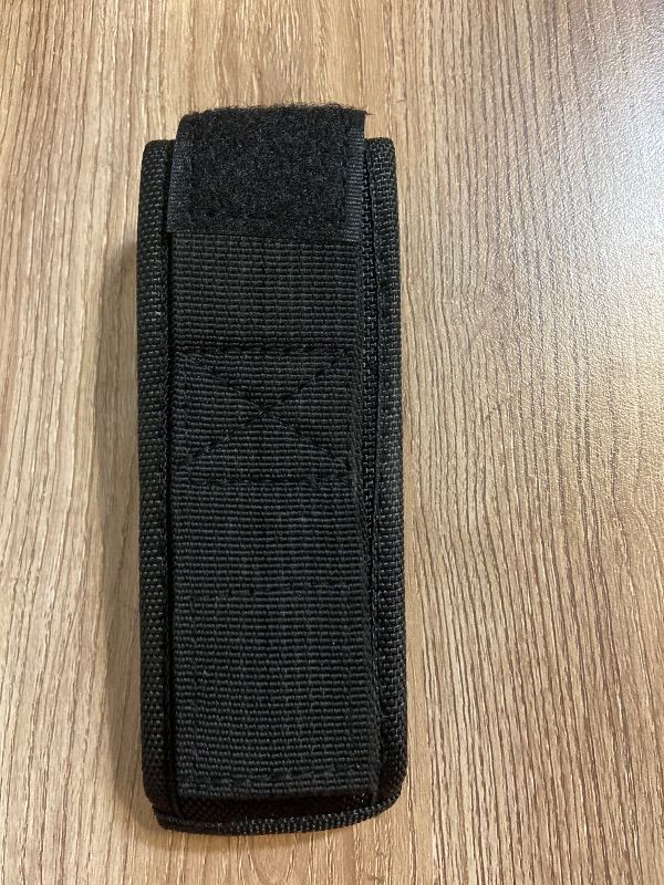 Photo 1 of *6inx2in Black nylon sheath typically designed for a folding knife or multi-tool
