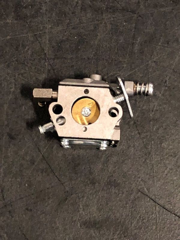 Photo 1 of 2-stroke diaphragm carburetor typically used on small utility engines like the Tecumseh AV520 series for ice augers