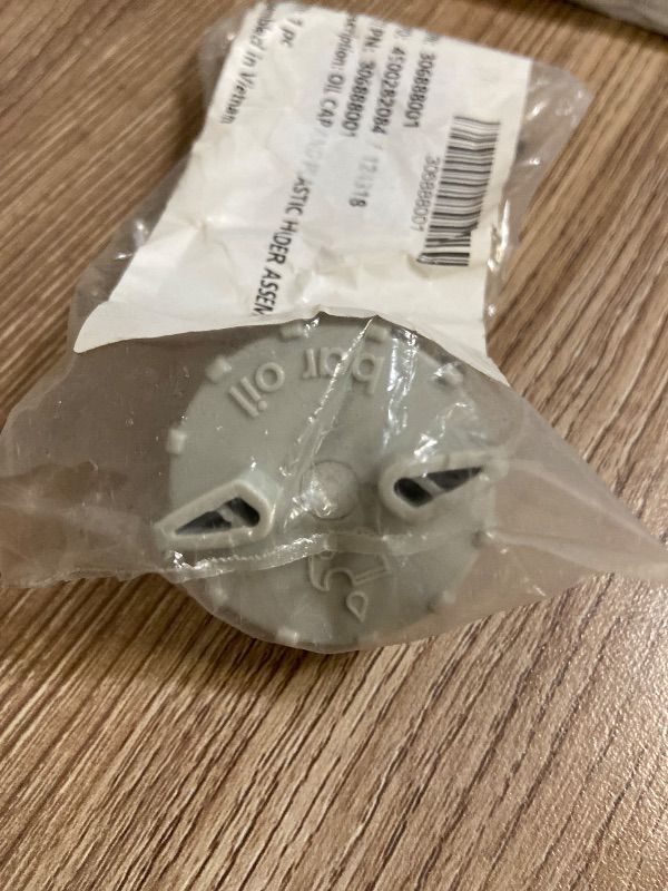 Photo 1 of 1pc genuine OEM Ryobi/Homelite Oil Cap and Plastic Holder Assembly