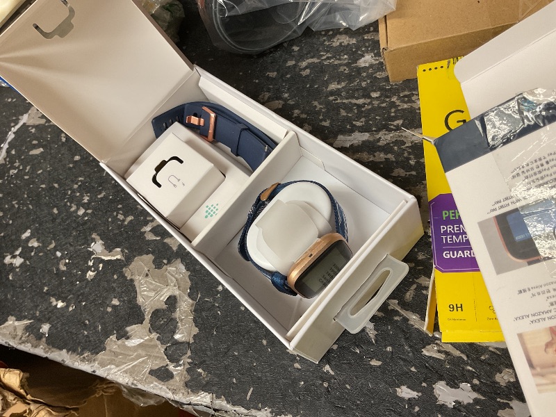 Photo 1 of Fitbit Versa 2 Special Edition Health and Fitness Smart Watch with Heart Rate, Music, Alexa Built-In, Sleep and Swim Tracking, Navy and Pink Woven/Copper Rose, One Size (S and L Bands Included), 2.3