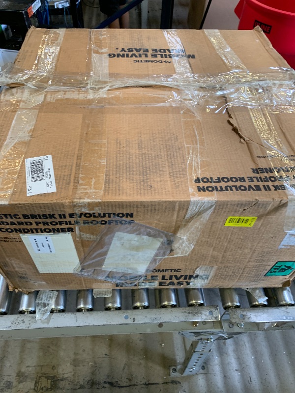 Photo 1 of Dometic Brisk II Rooftop Air Conditioner - Standard Profile AC with Efficient Cool Air Output -11K BTU Unit with Quiet Blower for RV, Van, and Camper (Brisk Black 11K)