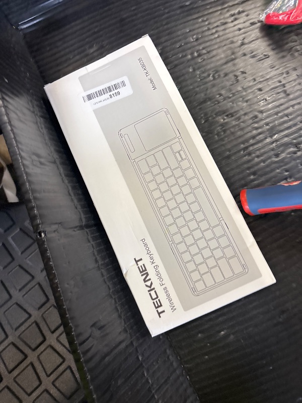 Photo 1 of TECKNET Foldable Bluetooth Keyboard with Touchpad & Numpad