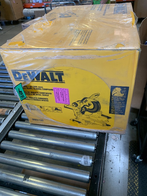 Photo 1 of DEWALT Miter Saw, 12-inch Double Bevel Sliding Compound Miter Saw with XPS LED Shadow Light System, Includes Blade Wrench, Material Clamp and Dust Bag (DWS780) (factory sealed)